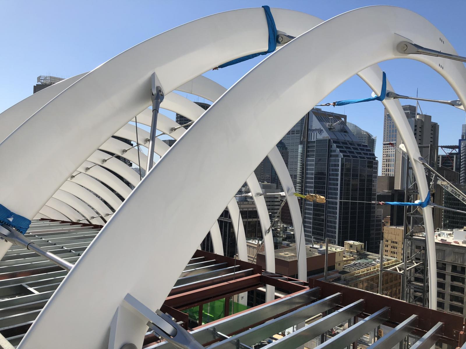 This architectural metal roof design for Arc by Crown Group is inspired by Sydney Harbour Bridge and Opera House